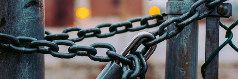macro shot of stainless steel padlock