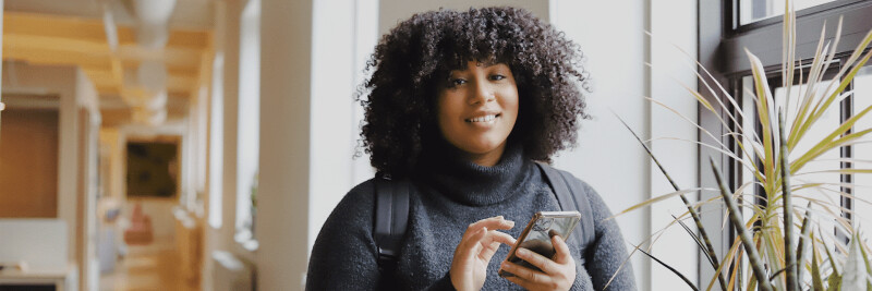 Woman uses PDFpen features on her iPhone